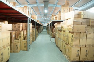 boxes on shelves in a warehouse